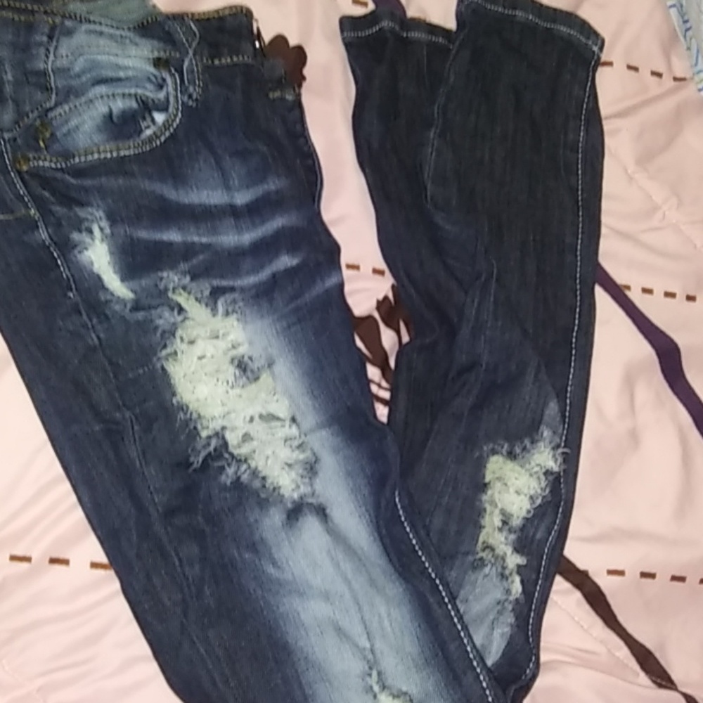 ripped blue jeans,